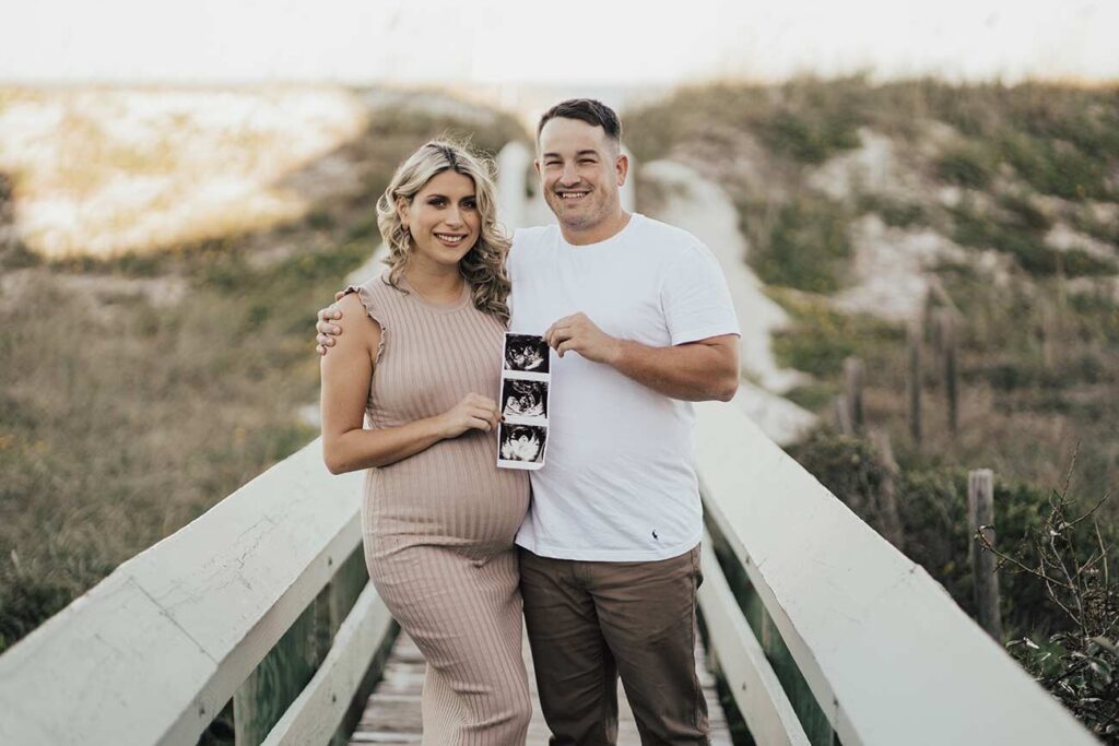 Sweet couples maternity session on beach