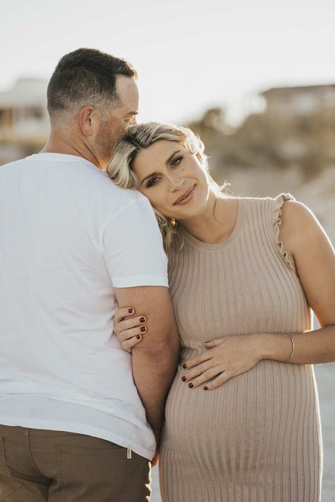 Husband and Wife maternity session on beach