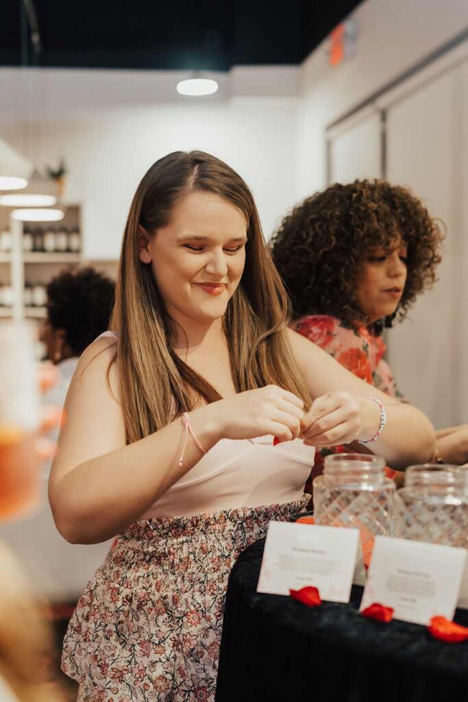 Women making candles in class