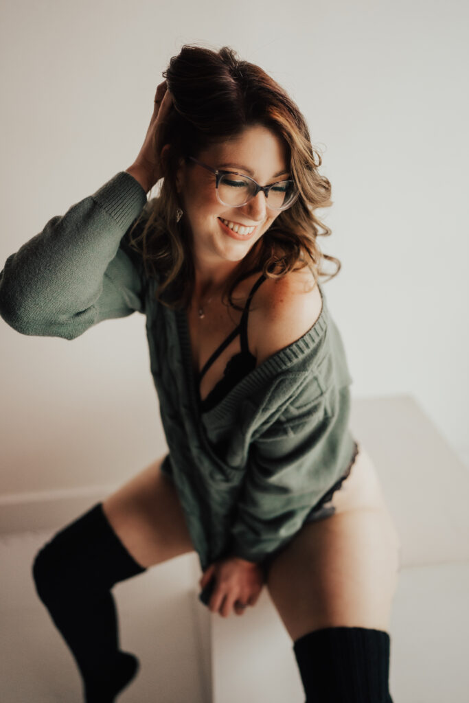 Woman posing in a unique boudoir photoshoot