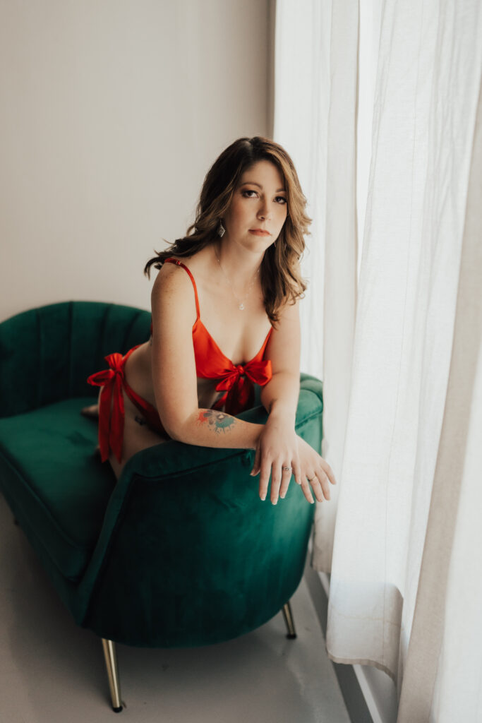 Woman posing in a boudoir photoshoot