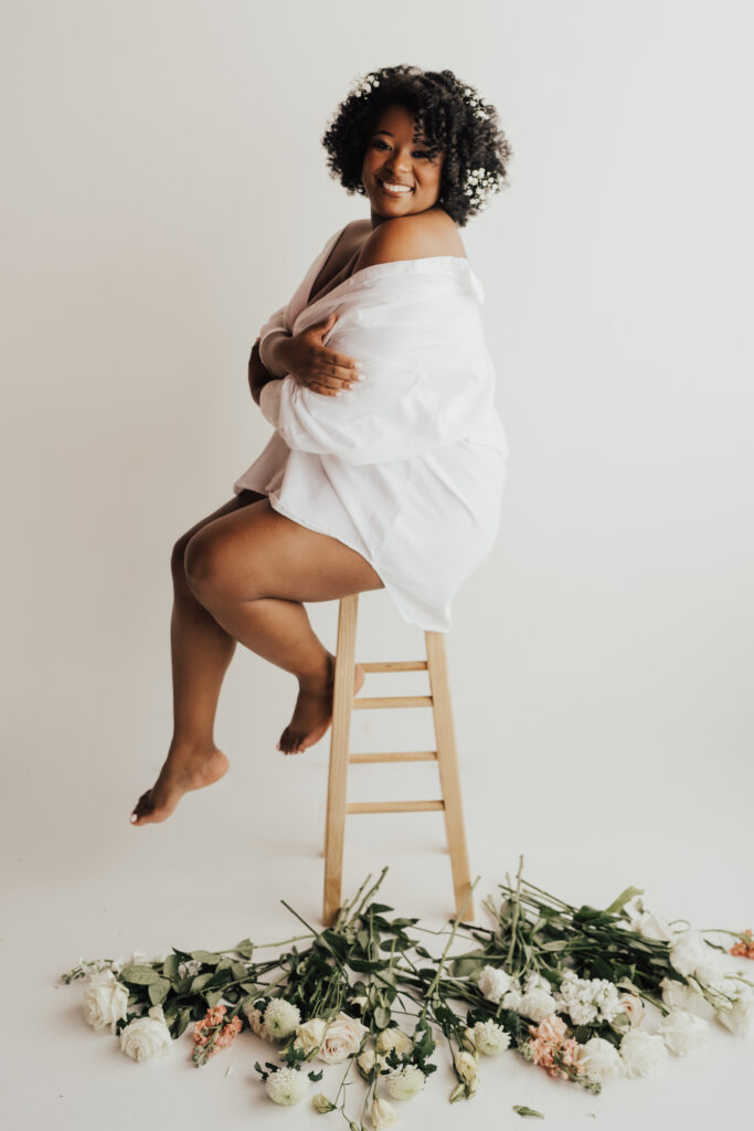 women sitting on stool for boudoir photoshoot